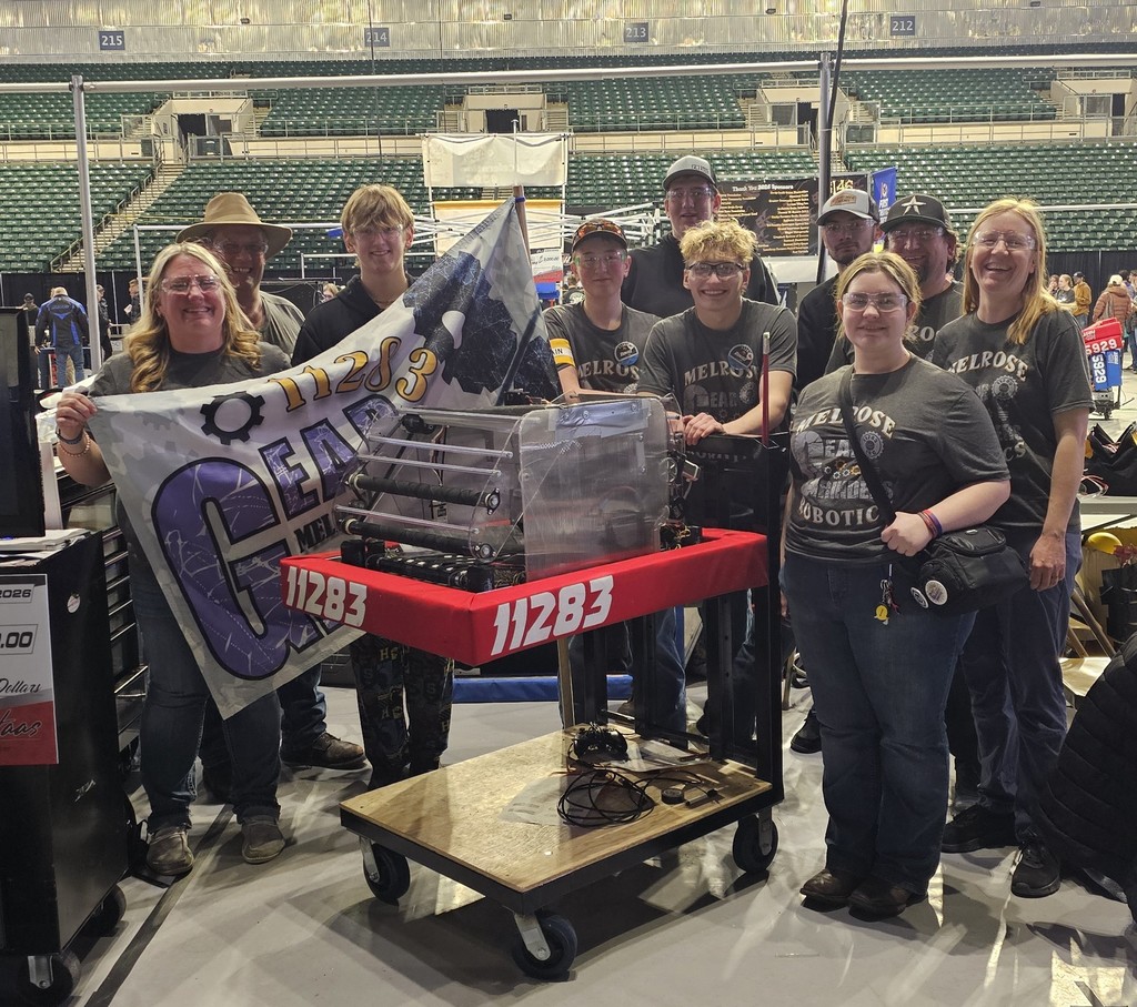 Team and robot in the pit